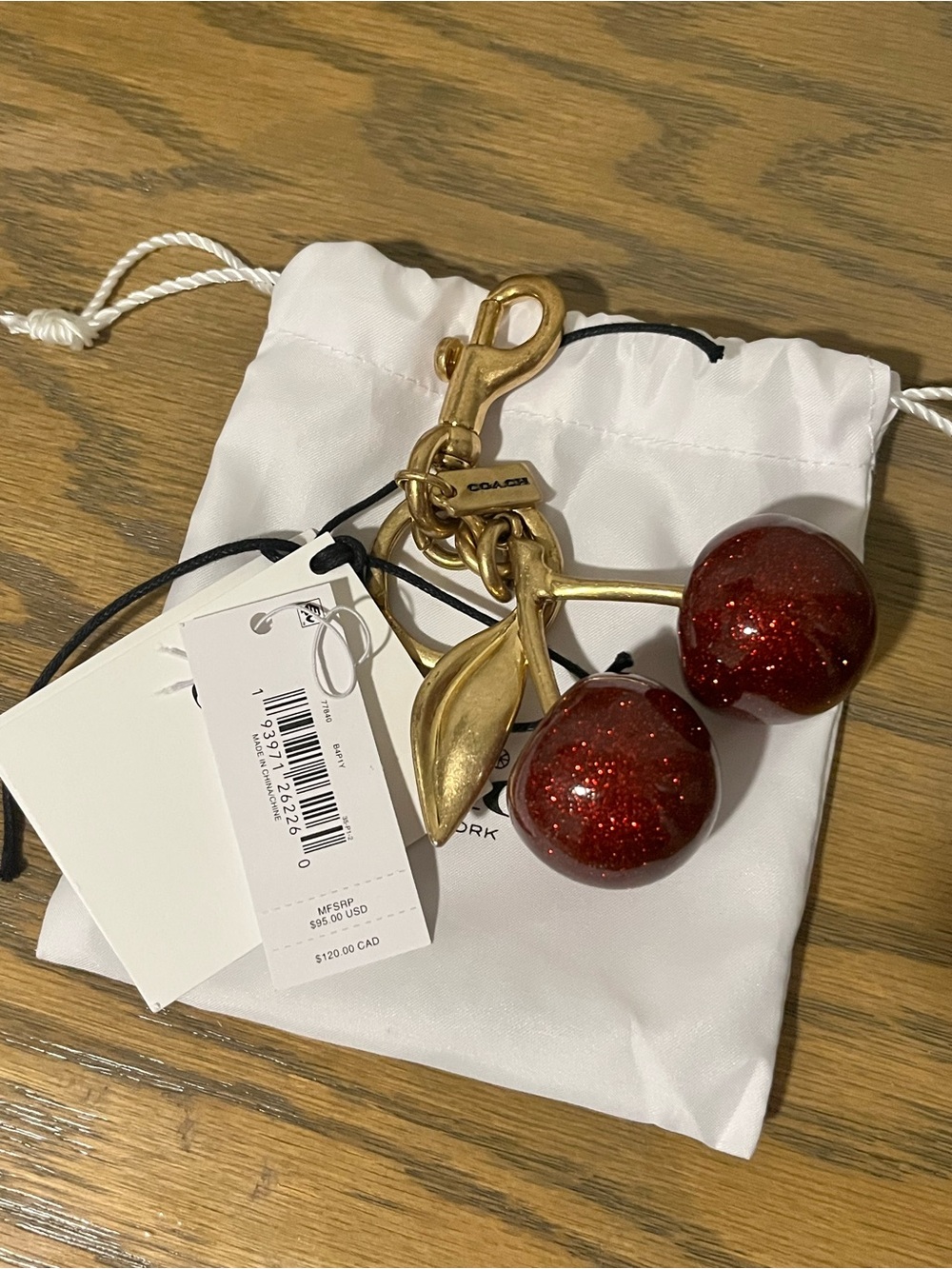 Coach Gold-Tone Cherry Keychain with Red Accents